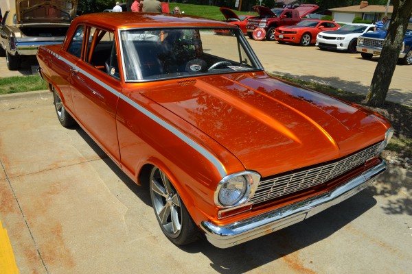 orange Chevy II Nova muscle car at Summit Racing car show, 2013