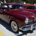 Bullet nose Studebaker champ at a classic car show thumbnail