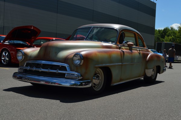 lowered chevy postwar coupe at car show, 2013