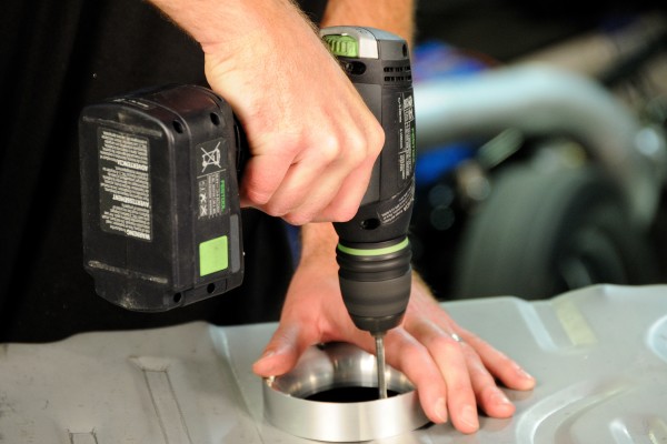 drilling holes into a fuel tank for a fuel pump install