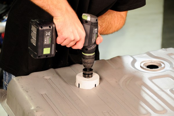 cutting hole for fuel pump installation in gas tank