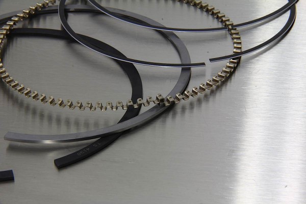 total seal piston rings on a metal table