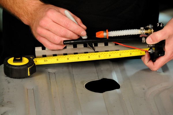 measuring and cutting fuel pump hanger bracket