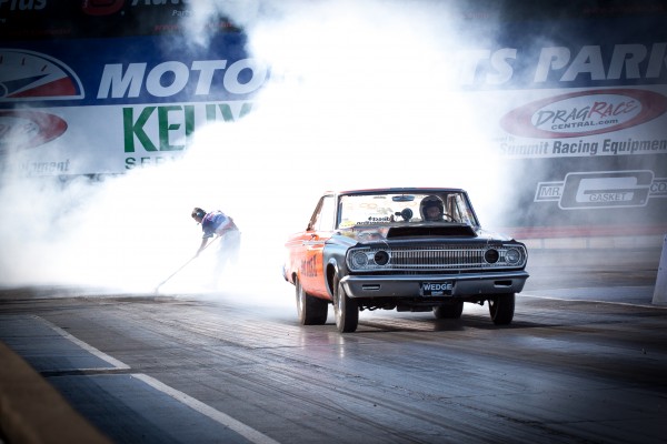 MOPAR DRAG CAR STAGING AFTER BURNOUT AT DRAG STRIP
