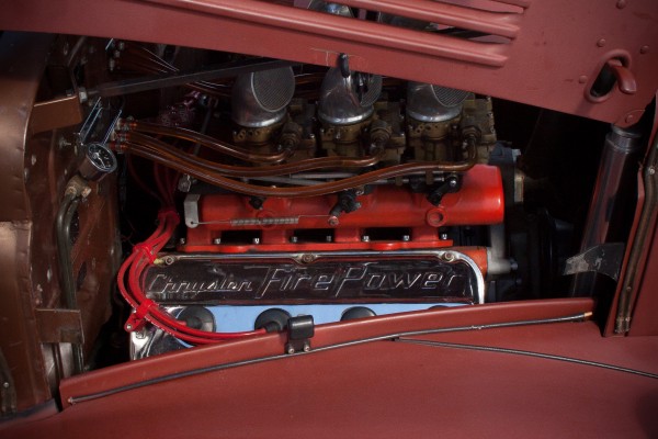 firepower hemi engine in a vintage plymouth coupe