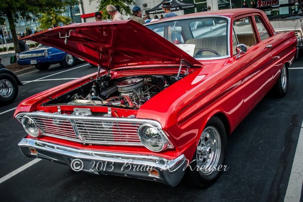 red vintage ford muscle car
