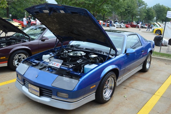 blue and silver third gen chevy camaro