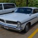vintage pontiac bonneville coupe at a vintage car show thumbnail