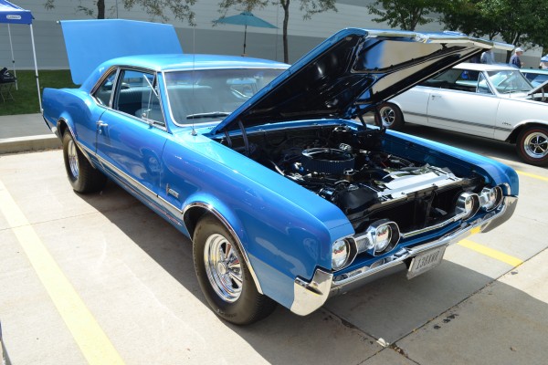 blue Oldsmobile cutlass hardtop coupe
