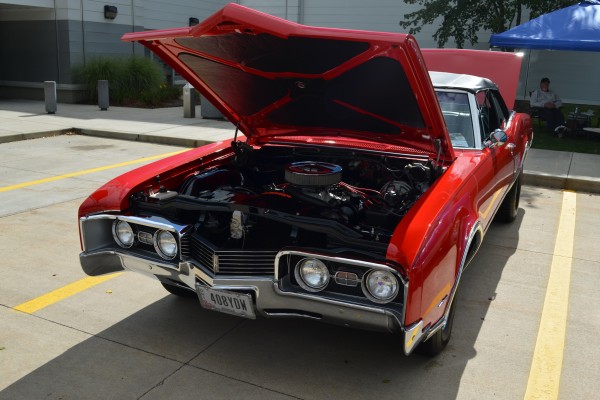 red oldsmobile cutlass convertible coupe