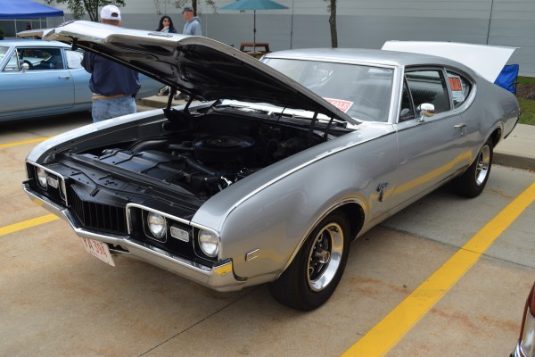 silver oldmsobile 442 cutlass fastback coupe