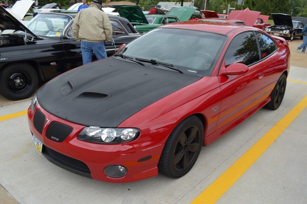 pontiac gto holden monaro era with a custom hood