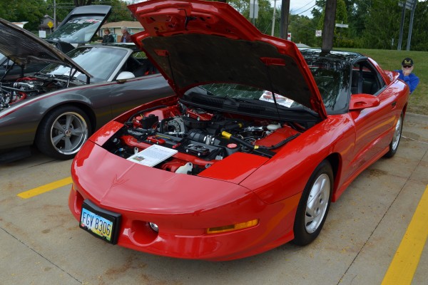 red Pontiac firebird coupe, fourth gen