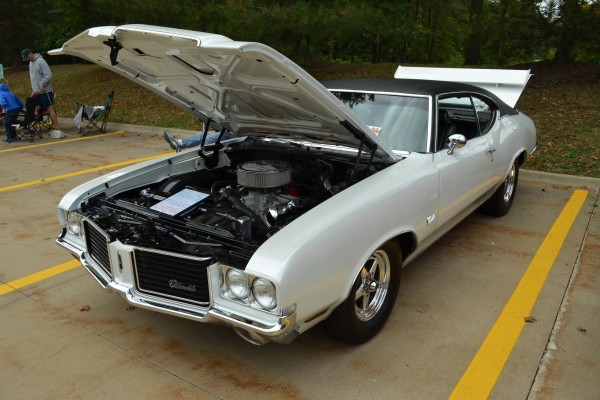 white oldsmobile cutlass fastback coupe