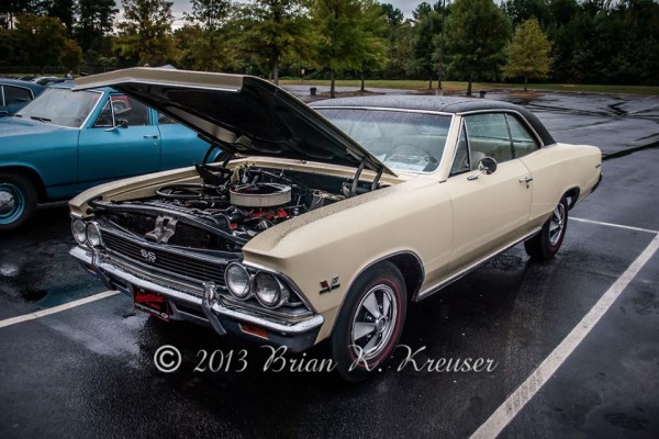 white first gen Chevy Chevelle with black vinyl top