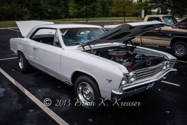 white chevy chevelle ss coupe at car show