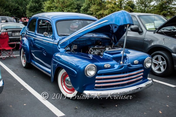 Vintage prewar hot rod coupe at a car show