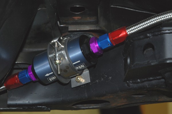 Fuel Filter bolted to the frame of a race car