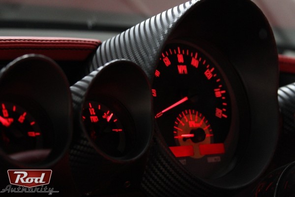 custom modern dash gauge display on a vintage hot rod