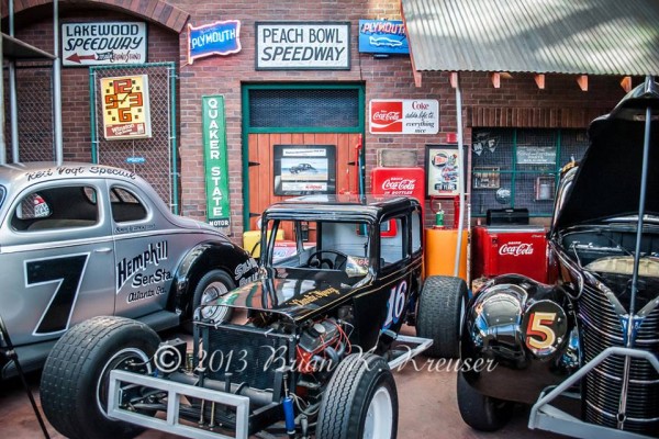 vintage race cars at a car show display