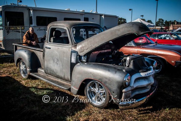vintage chevy 3100 series truck at a car show