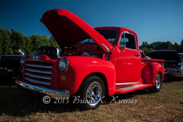 vintage gmc 3100 series pickup truck at a car show