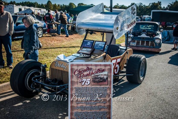 vintage sprint car at a car show