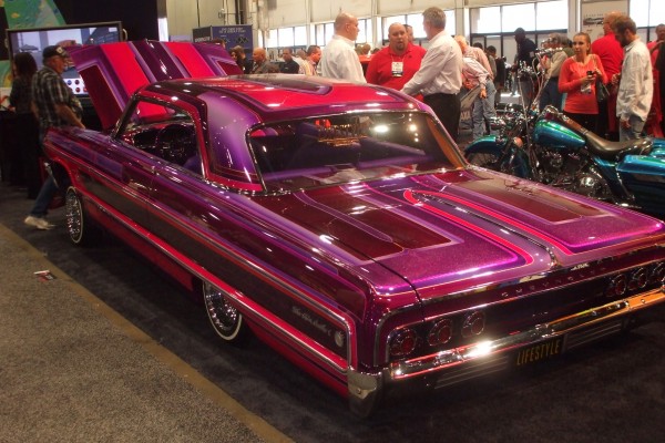 vintage chevy impala lowrider with custom candy flake paint