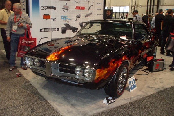 1968 pontiac firebird with flamed paint job displayed at SEMA 2013