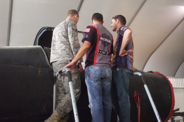 nhra drivers getting a military exhibition tour during overseas visit