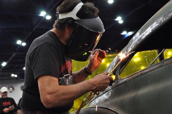 gene winfield welding in a window frame