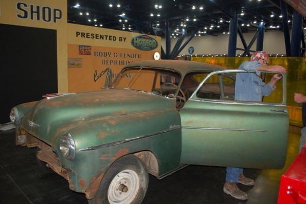 a chevy coupe getting turned into a hot rod