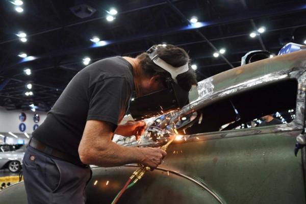 gene winfield welding on a hot rod window frame