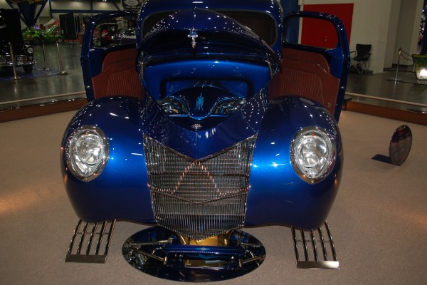 front end of a 1940 Ford pickup in car show display