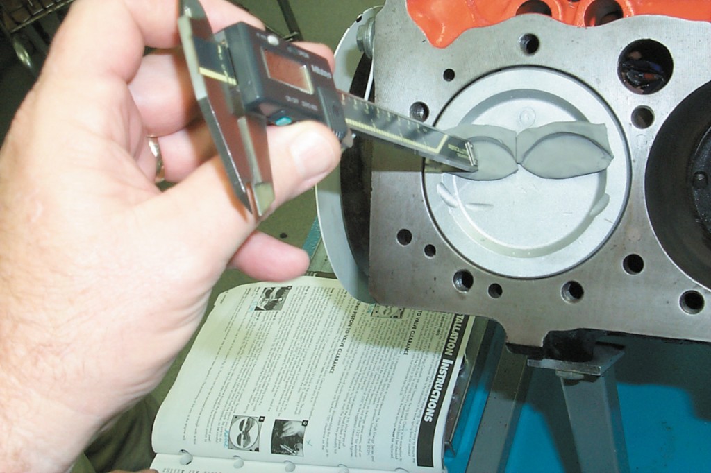 checking piston to valve clearance with a plastigage and caliper