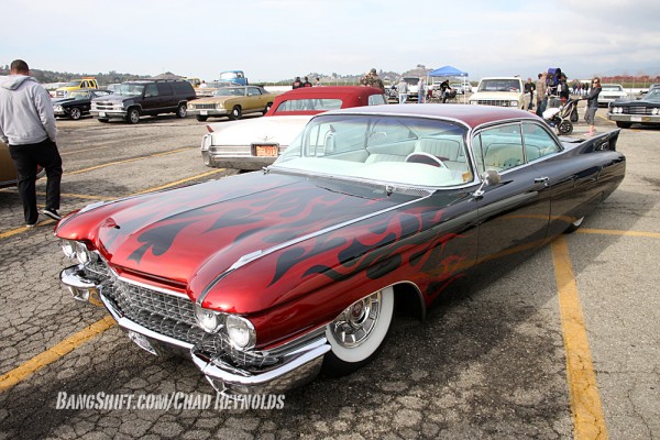 hot rod 1960s era Cadillac coupe with flames