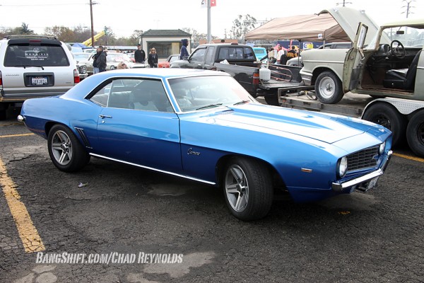 1969 chevy camaro with gen-3 wheels at a car show