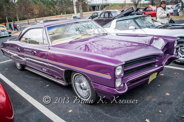 purple 1960s pontiac catalina lowrider coupe