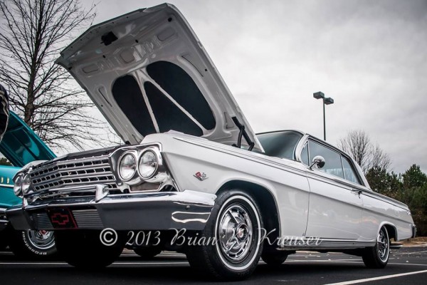 white 1960s era chevy impala coupe