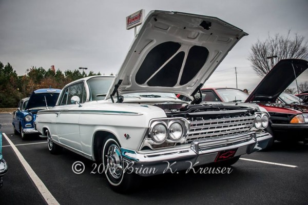 vintage white chevy impala coupe