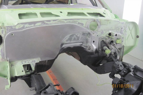 firewall of a 1967 camaro primered and ready to paint