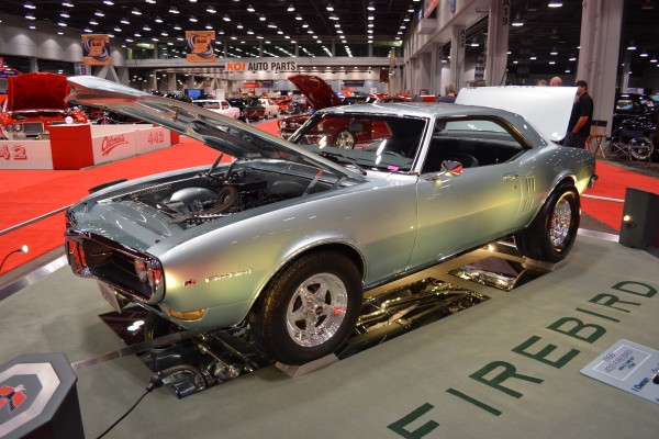 1968 Pontiac firebird custom drag car displayed at indoor car show