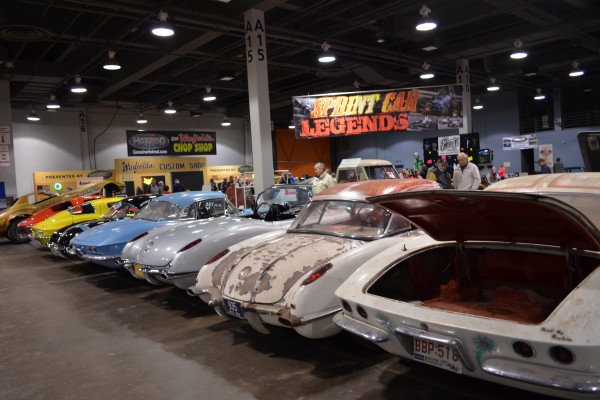 rear view of a row of vintage c1 and c2 corvette sting ray sports cars