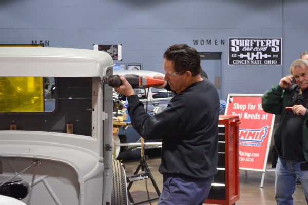 Gene Winfield cutting the roof off a hot rod
