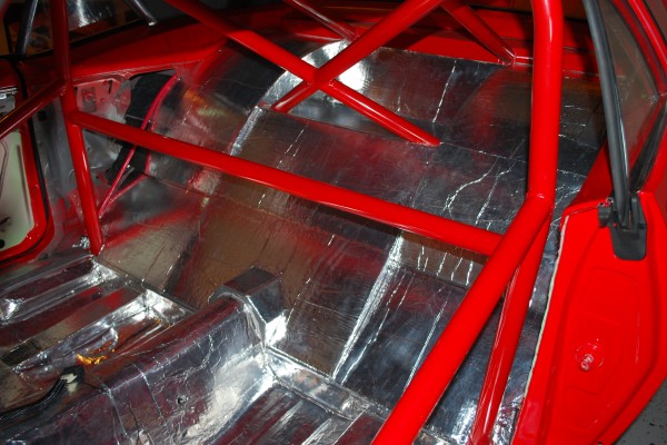 roll cage and sound/heat material in a pro street 1967 chevy camaro drag car