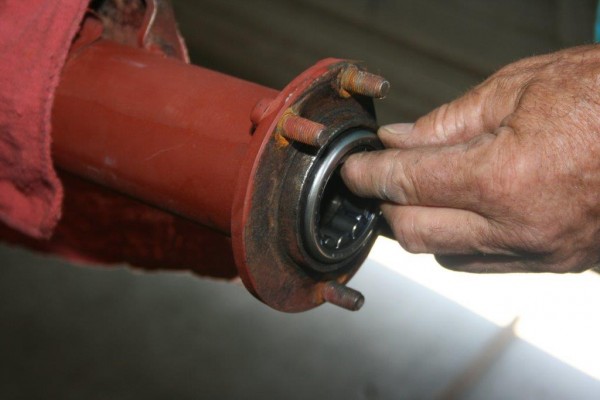 inserting a roller bearing into an axle housing