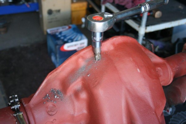 drilling and tapping a hole in an axle housing for an air line fitting