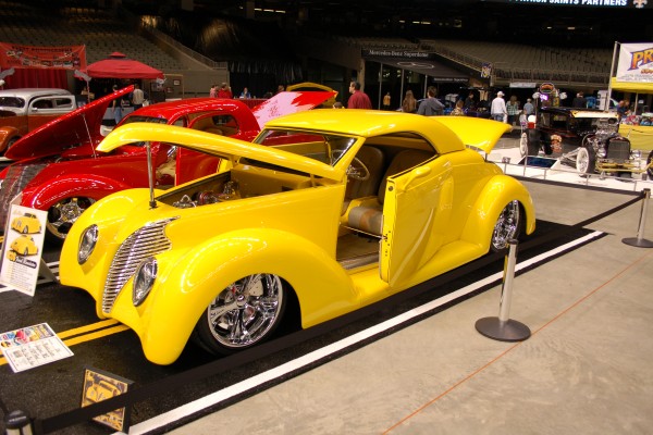 yellow custom prewar hot rod coupe Displayed at Indoor Car Show