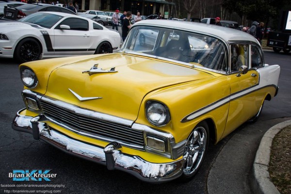 yellow and white 1956 chevy coupe