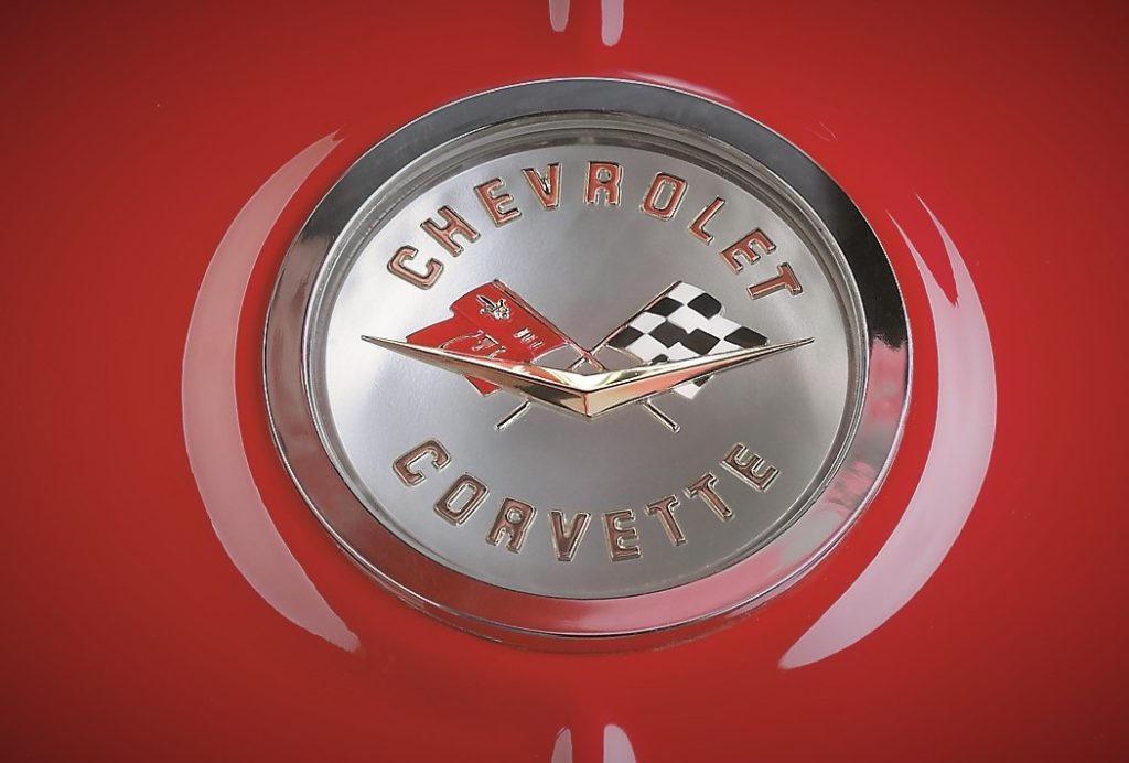 Close up of trunk cross flags emblem on a c1 chevy corvette